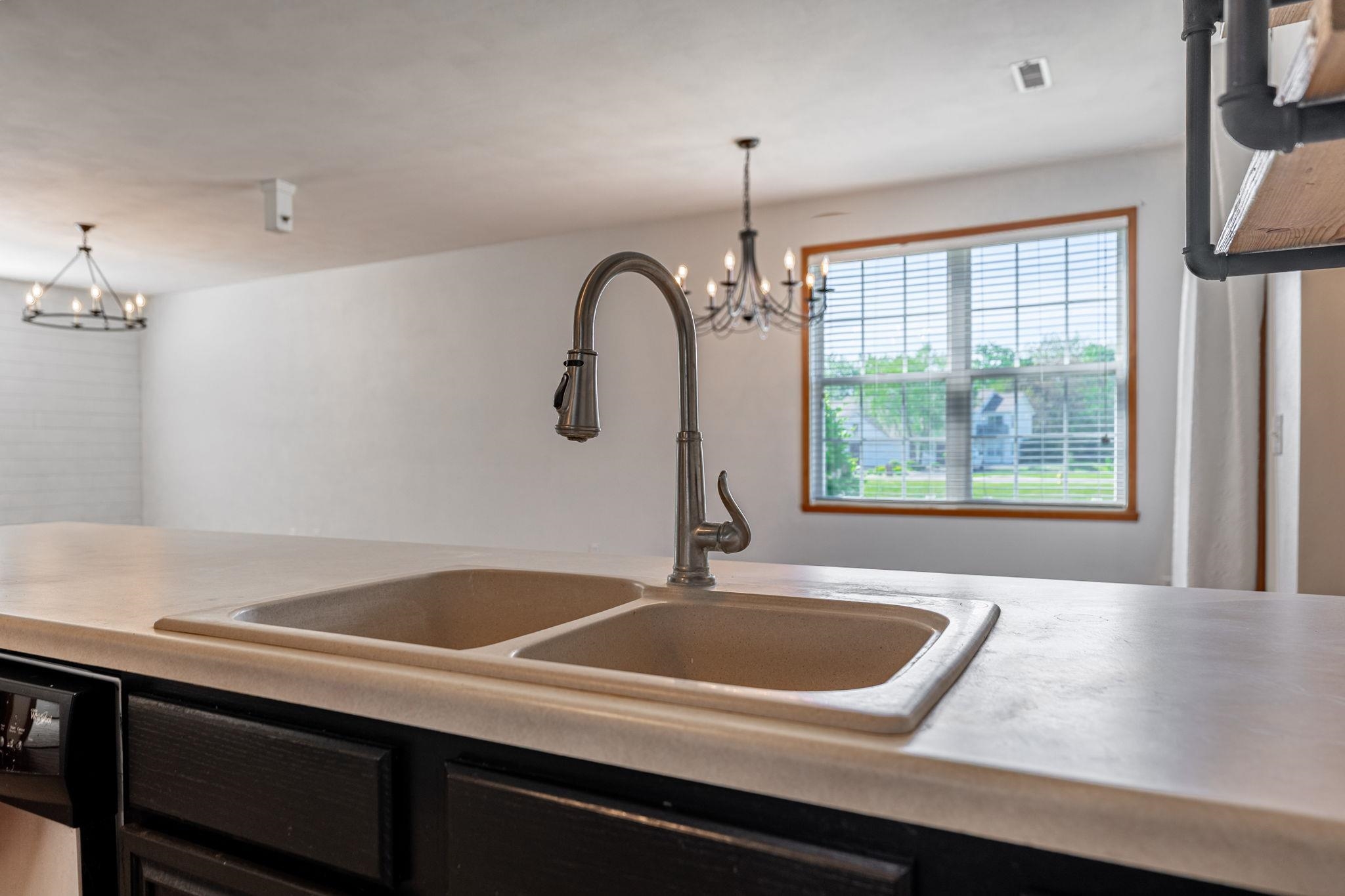 10113 Monarch Road Roscoe, IL 61073 - Photo 11 of 20 a sink with a window and outdoor space