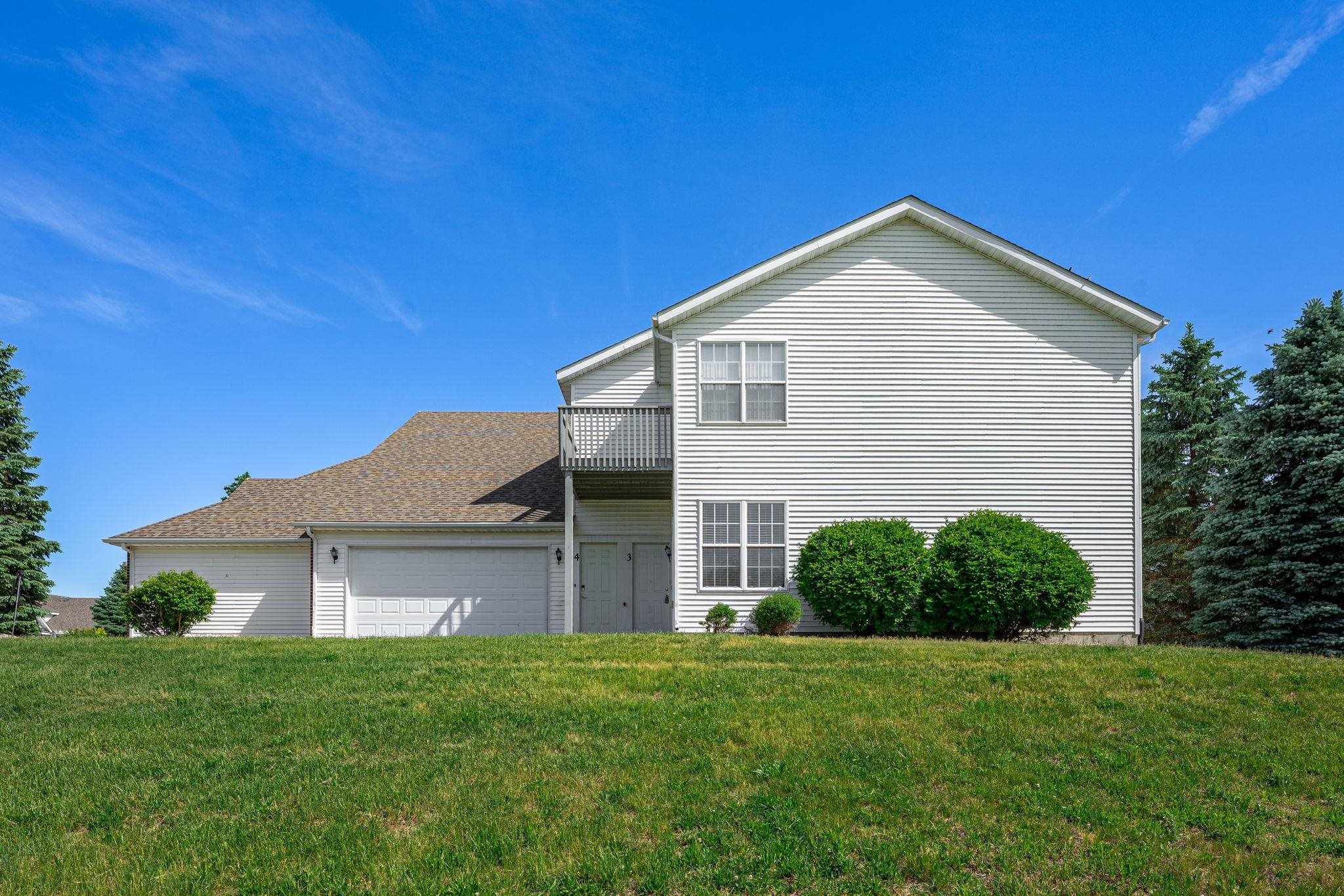 10113 Monarch Road Roscoe, IL 61073 - Photo 3 of 20 a view of a house with a yard