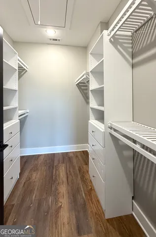 a view of an empty walk in closet