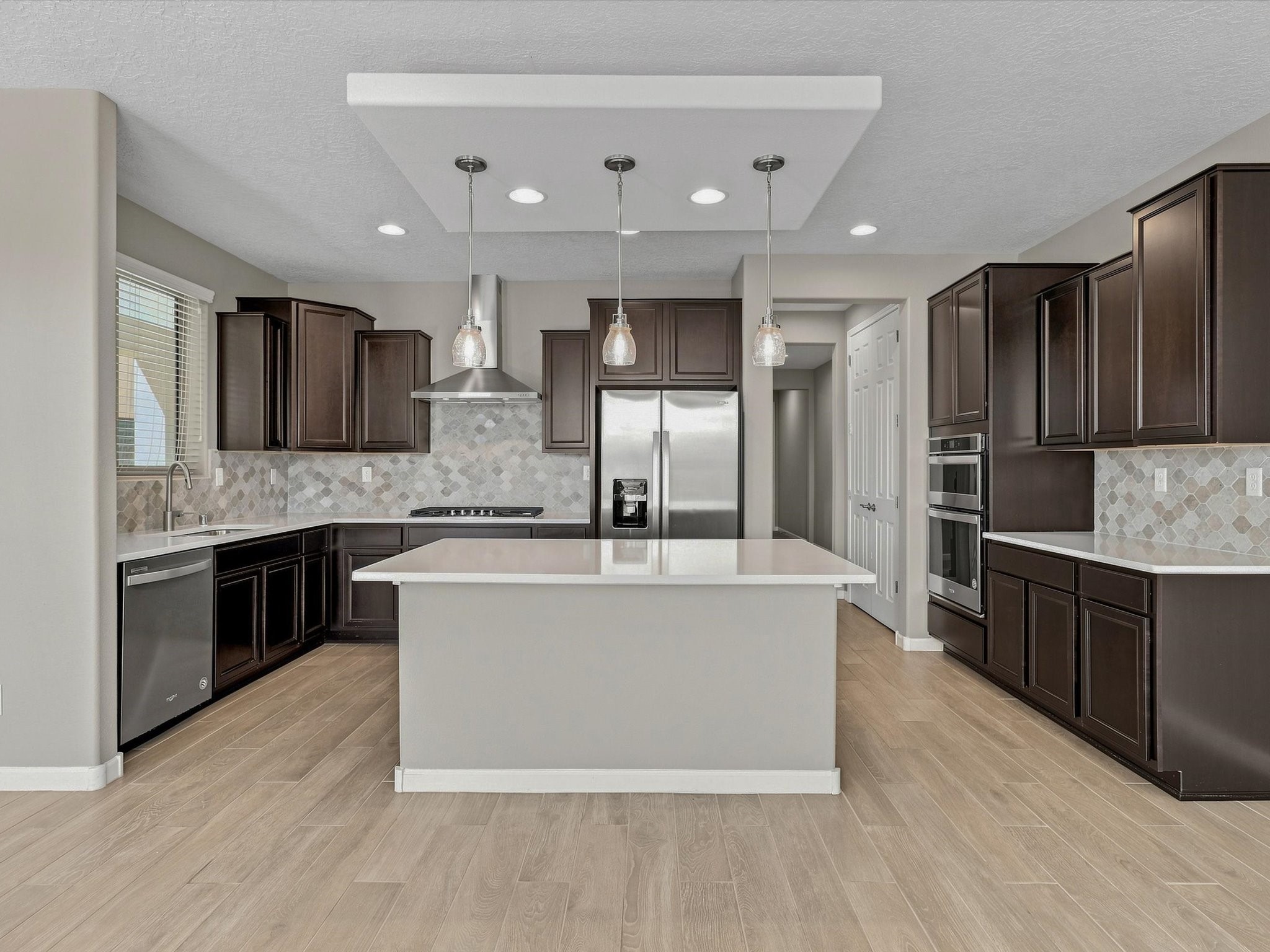 4642 Rail Runner Road Santa Fe, NM 87507 - Photo 14 of 74 The kitchen comes equipped with appliances, making everyday living convenient from day one.