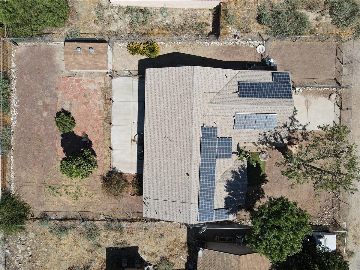51884 Ida Avenue Cabazon, CA 92230 - Photo 1 of 25 an aerial view of a house with a yard