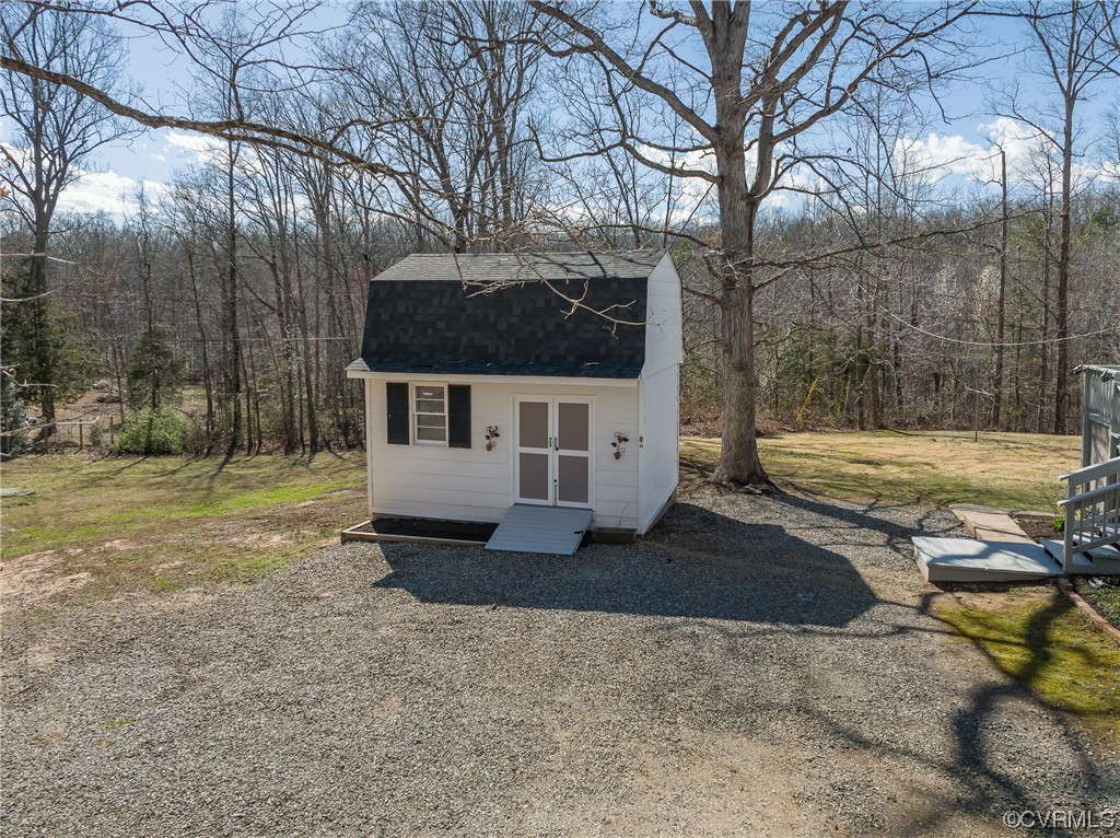 2341 Sheppard Town Road Maidens, VA 23102 - Photo 8 of 45 a front view of a house with a yard