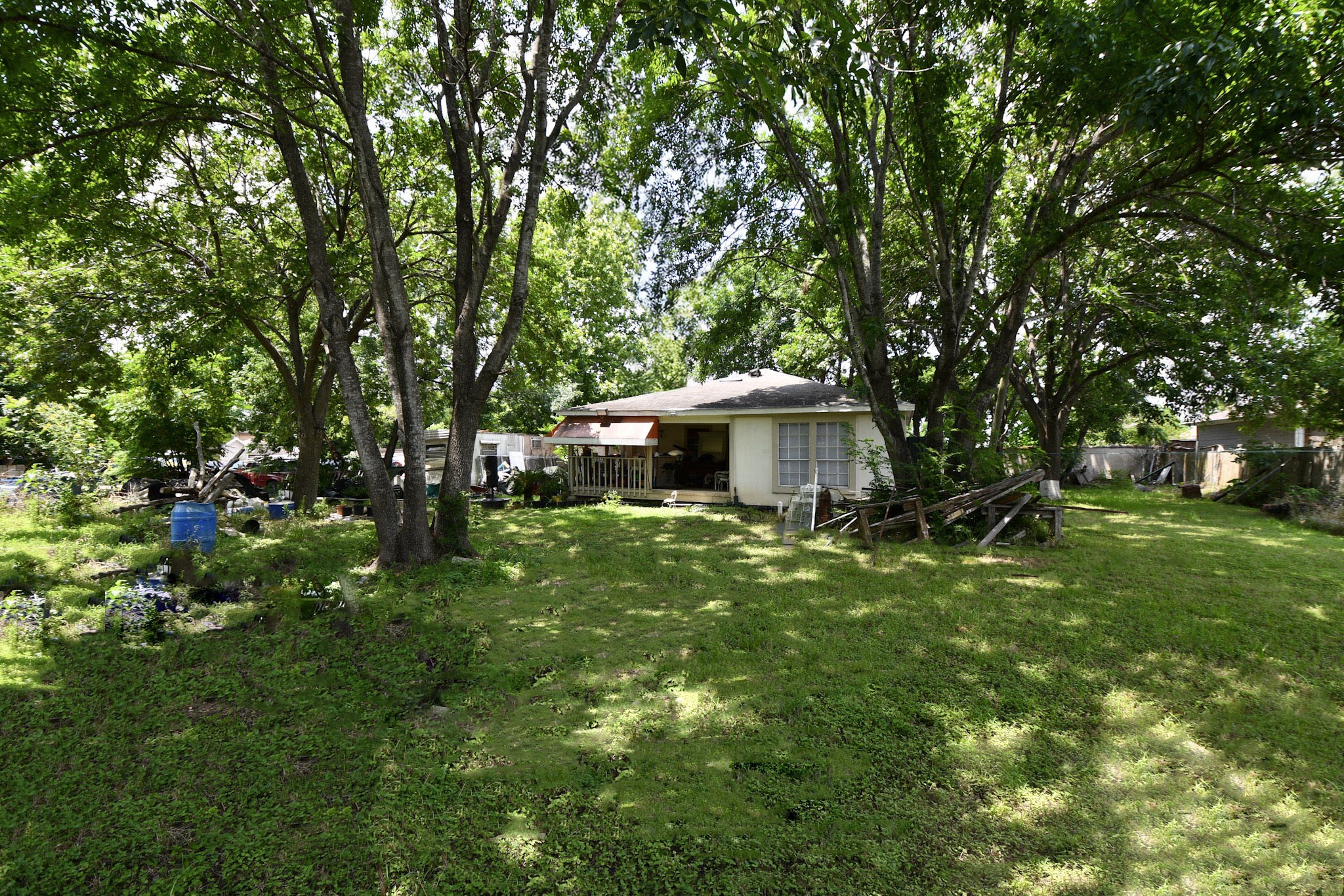 16005 Old Richmond Road Sugar Land, TX 77498 - Photo 11 of 46 a view of a house with a backyard