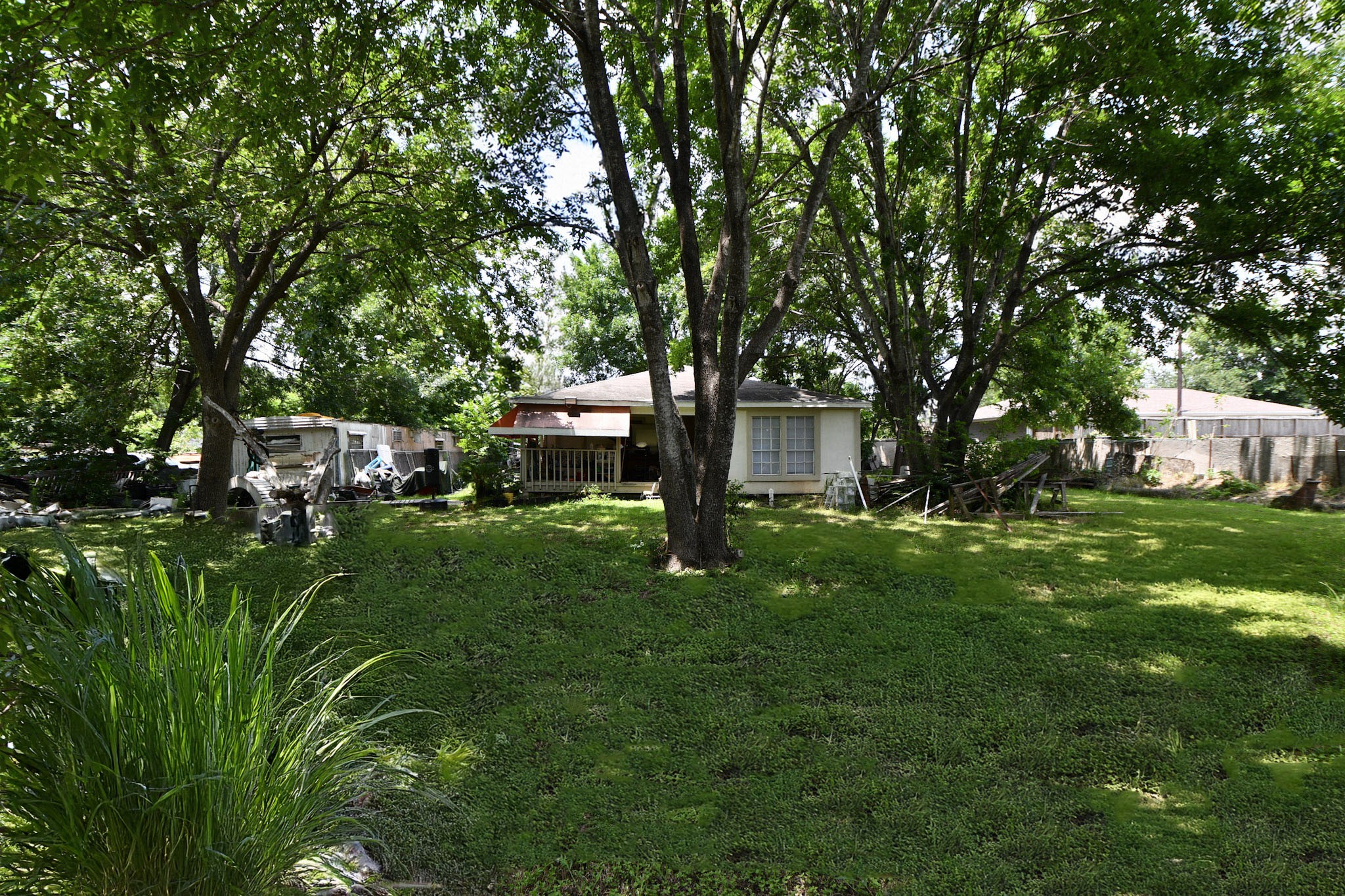 16005 Old Richmond Road Sugar Land, TX 77498 - Photo 13 of 46 a view of a house with a backyard