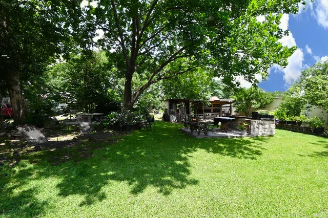 a view of a chair in a garden