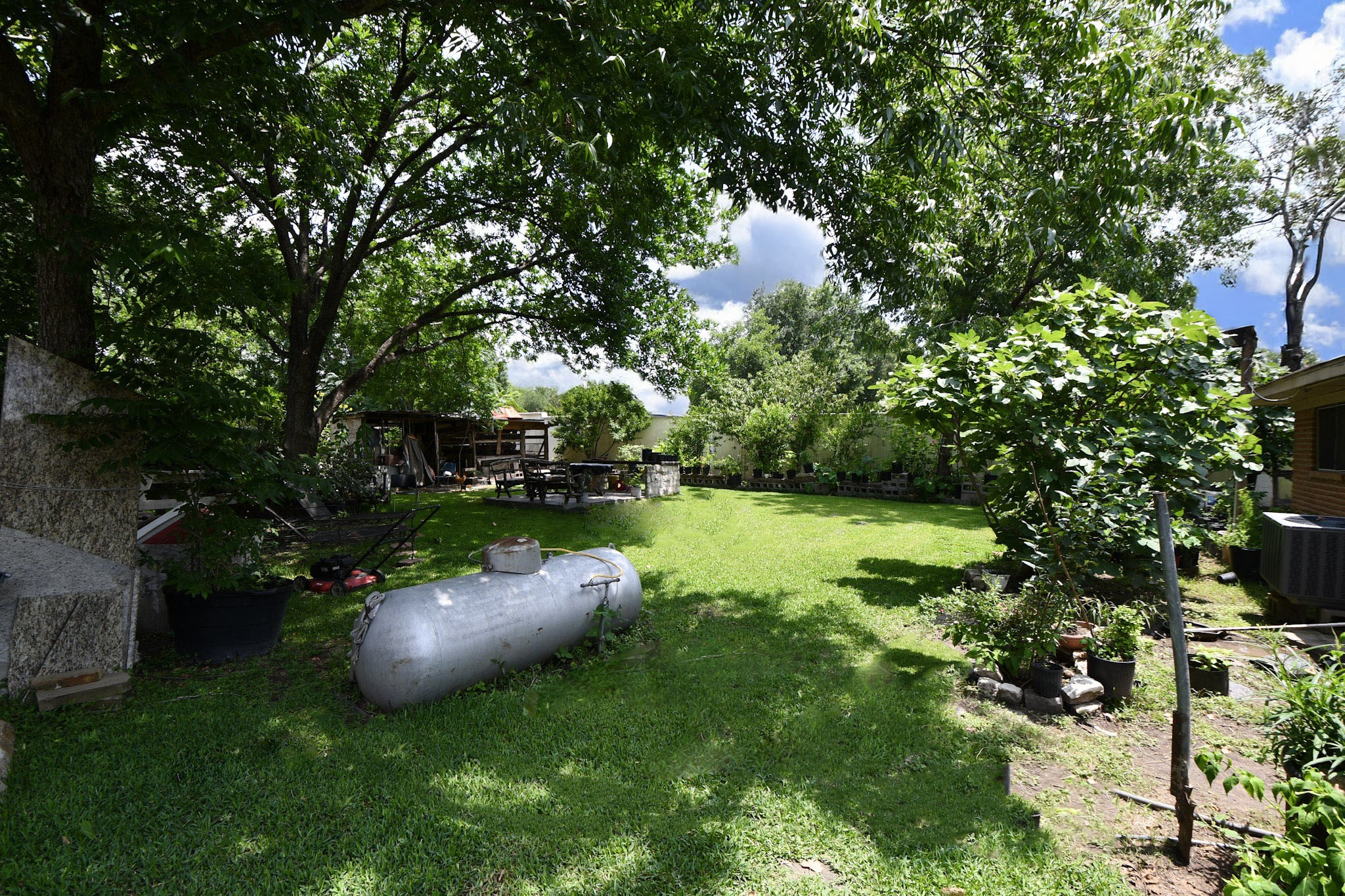 16005 Old Richmond Road Sugar Land, TX 77498 - Photo 15 of 46 a view of a garden with a slide