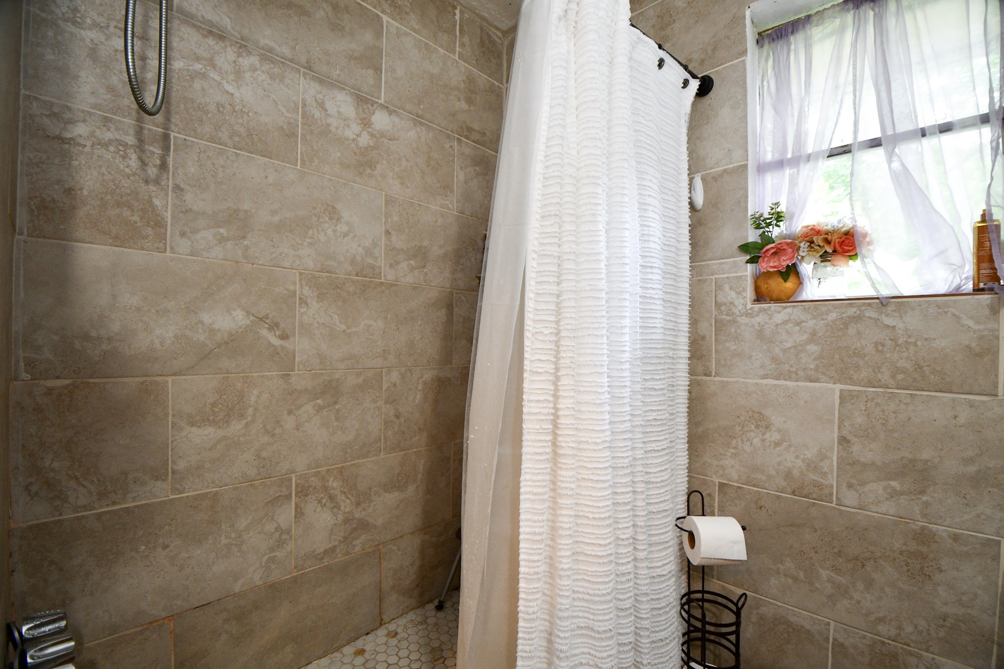 16005 Old Richmond Road Sugar Land, TX 77498 - Photo 20 of 46 a bathroom with a shower