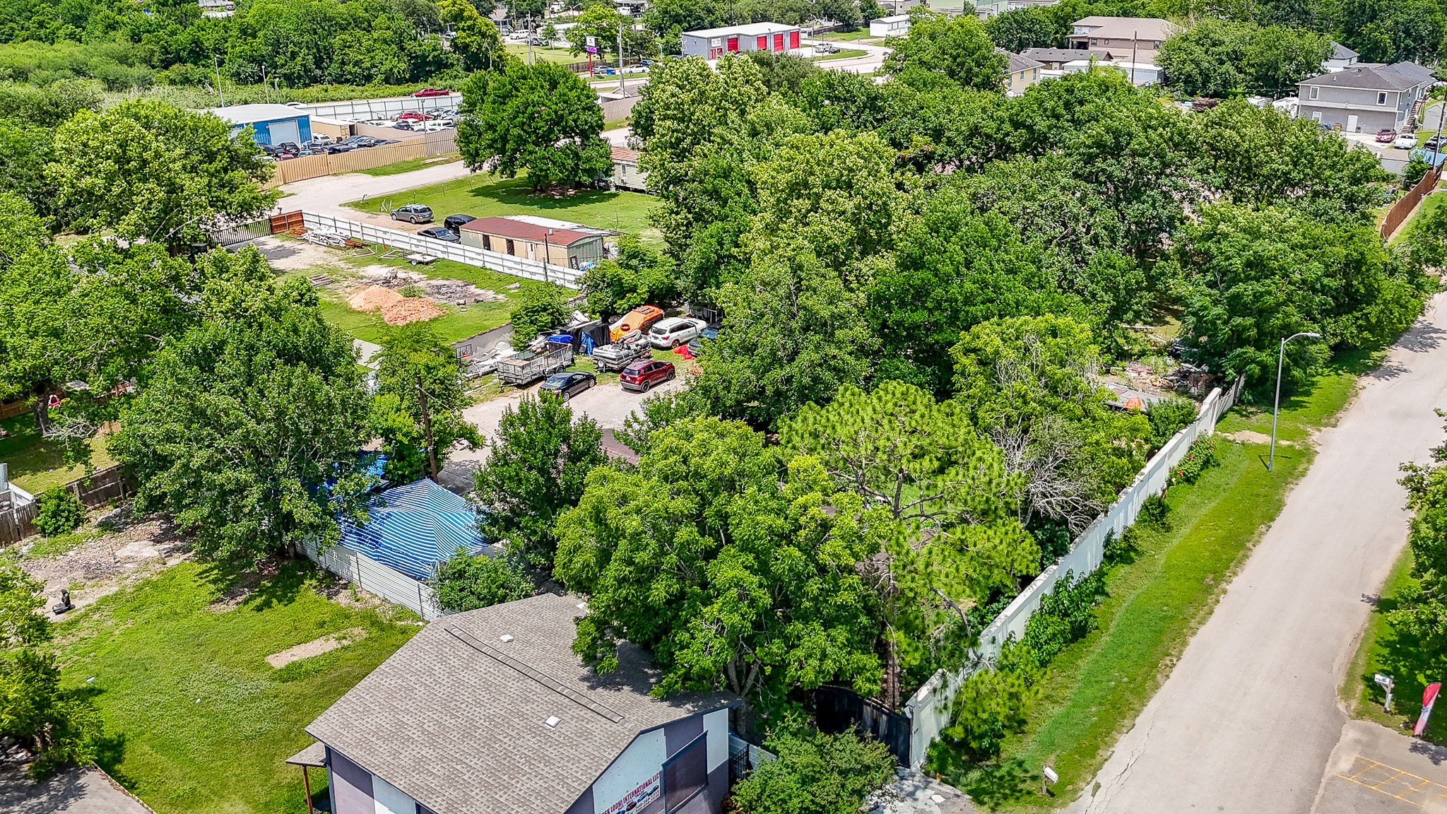 16005 Old Richmond Road Sugar Land, TX 77498 - Photo 2 of 46 an aerial view of a house with a yard
