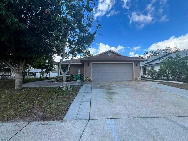 front view of a house with a garden