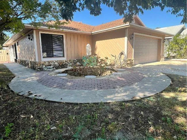 a view of a house with a patio
