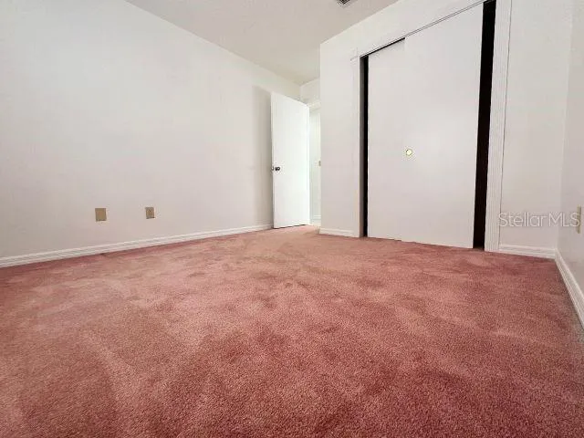 an empty room with closet