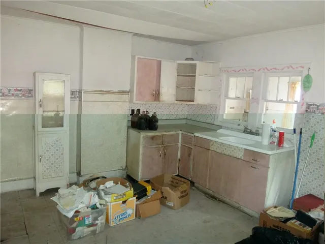 a room with sink and window