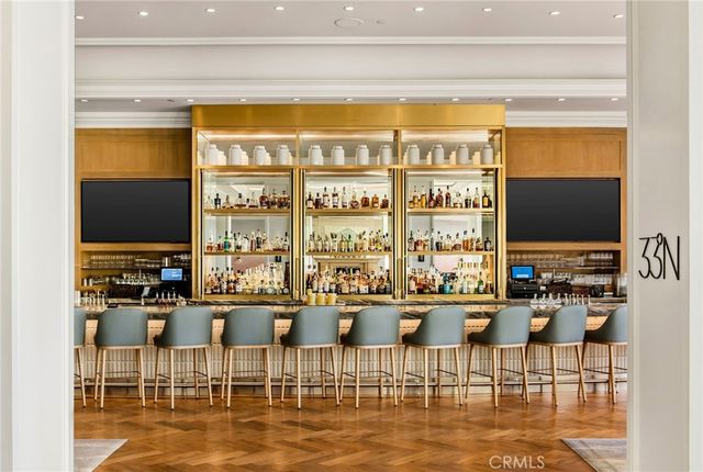 a view of a grassy field with trees