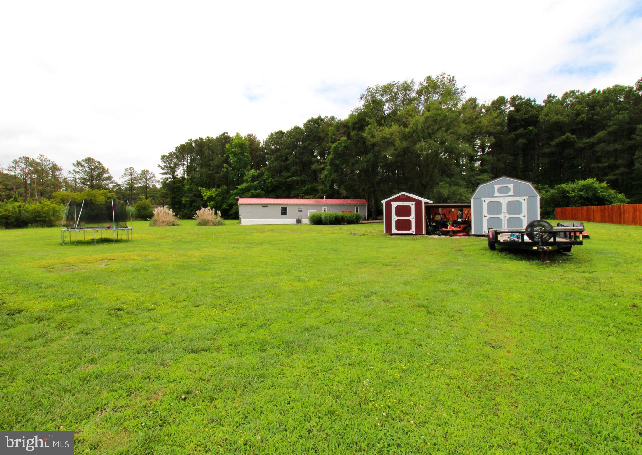 11276 Hodson White Road Deal Island, MD 21821 - Photo 24 of 27 a view of a house with a big yard