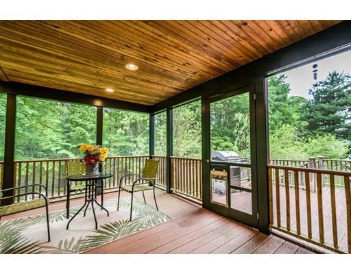 25 Farm Road Stow, MA 01775 - Photo 1 of 22 a view of a patio with a table chairs and a table