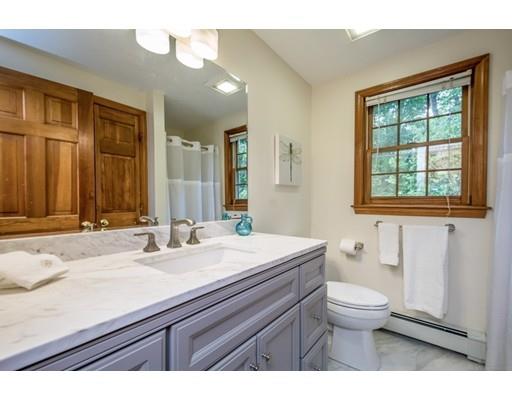 25 Farm Road Stow, MA 01775 - Photo 13 of 22 a bathroom with a granite countertop sink toilet and mirror