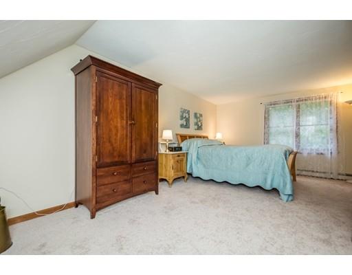 25 Farm Road Stow, MA 01775 - Photo 14 of 22 a living room with furniture and a dresser