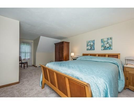 25 Farm Road Stow, MA 01775 - Photo 15 of 22 a bedroom with a bed and a dresser