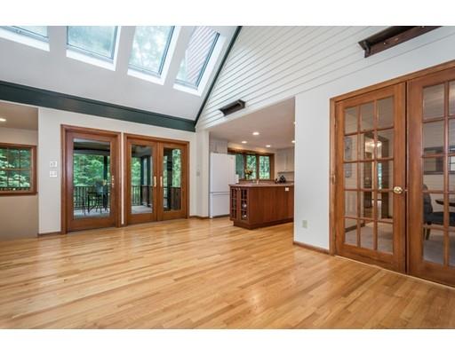 25 Farm Road Stow, MA 01775 - Photo 4 of 22 a big room with wooden floor and windows