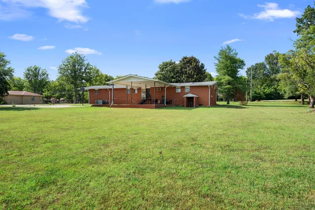 a view of a house with a big yard
