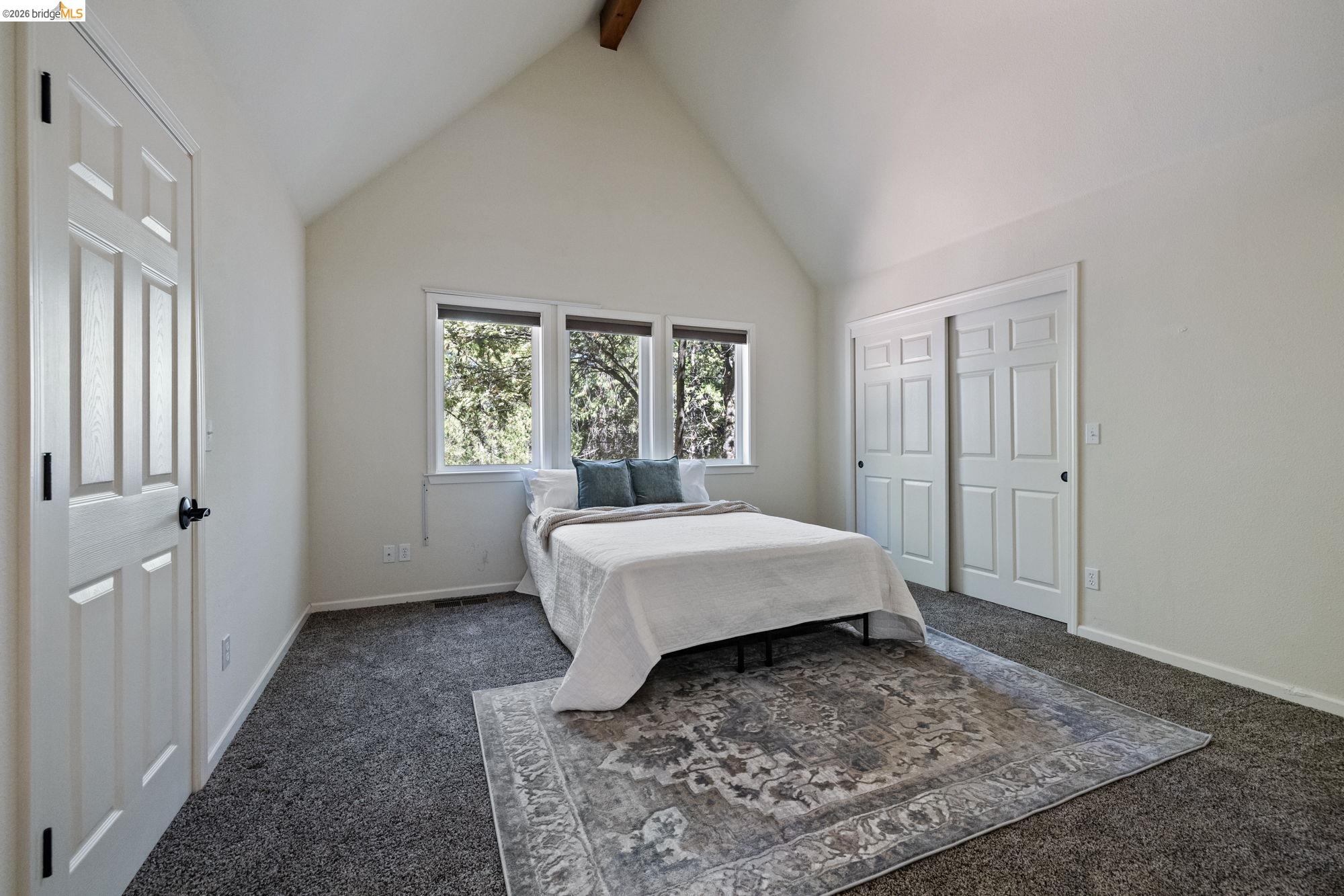 24669 Center Camp Road Twain Harte, CA 95383 - Photo 24 of 33 a bedroom with a bed and window
