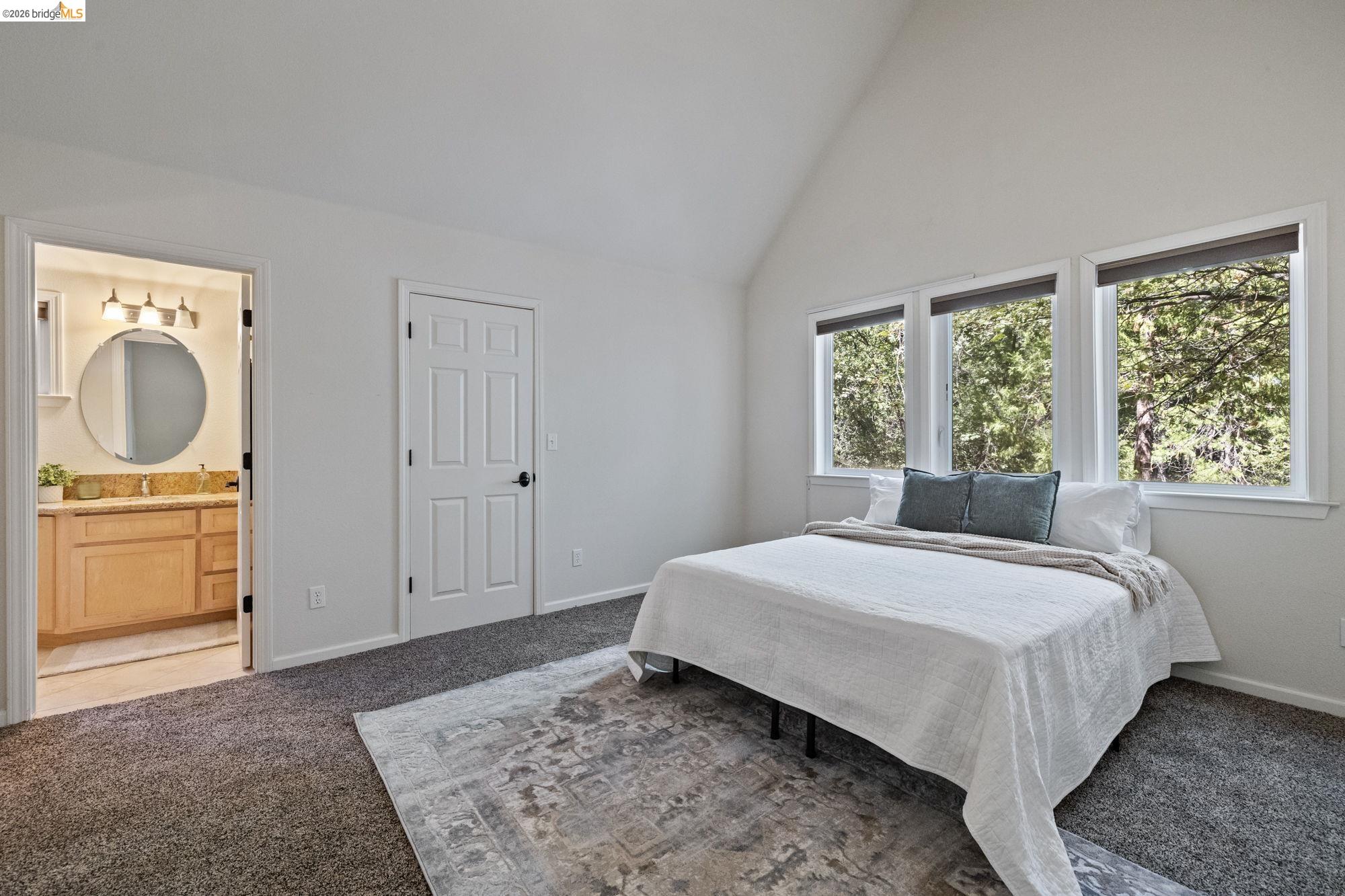 24669 Center Camp Road Twain Harte, CA 95383 - Photo 25 of 33 a bedroom with a bed and a dresser