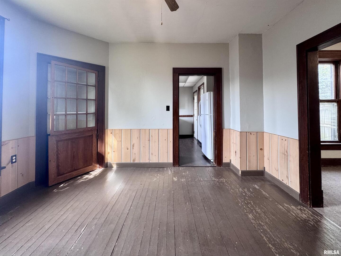 916 7th Street Fulton, IL 61252 - Photo 12 of 32 a view of a livingroom with wooden floor and closet