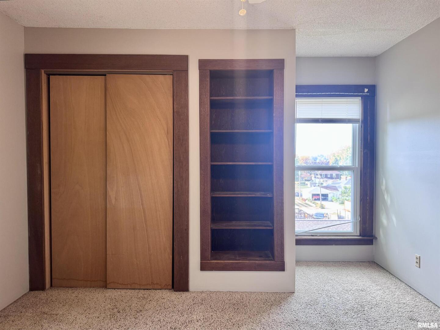 916 7th Street Fulton, IL 61252 - Photo 21 of 32 a view of an empty room with a window