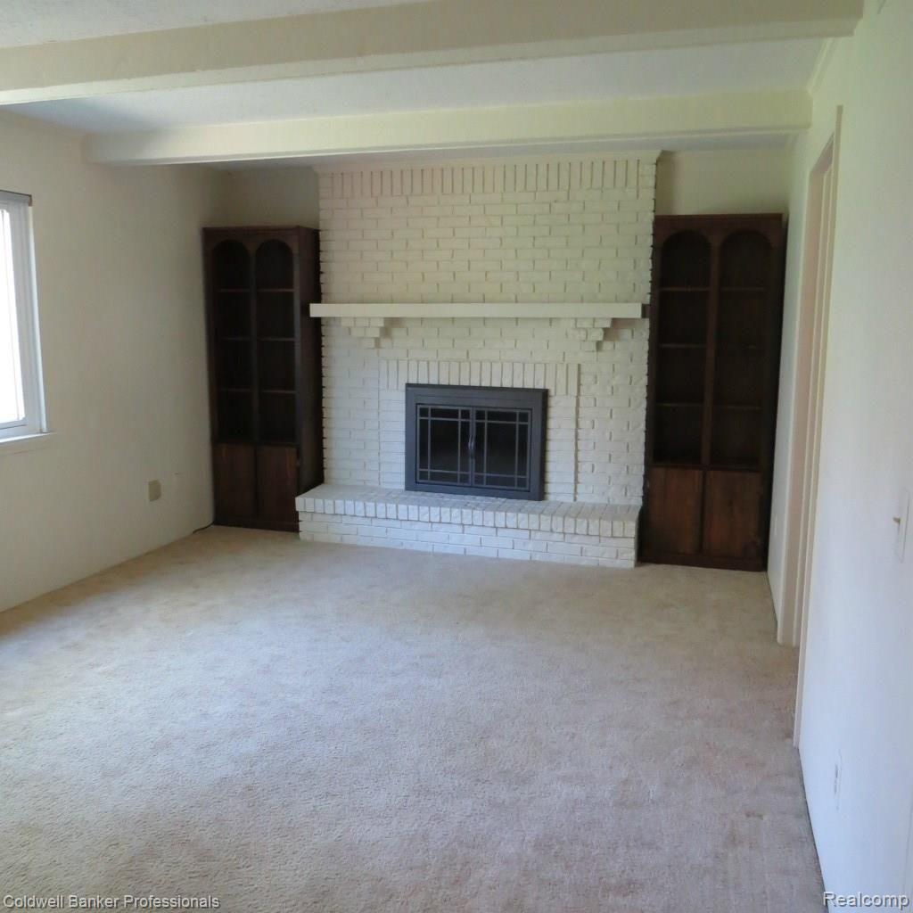 672 Rutgers Road Rochester, MI 48309 - Photo 18 of 44 Family room with pretty natural fireplace