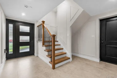 a view of entryway with stairs and stairs