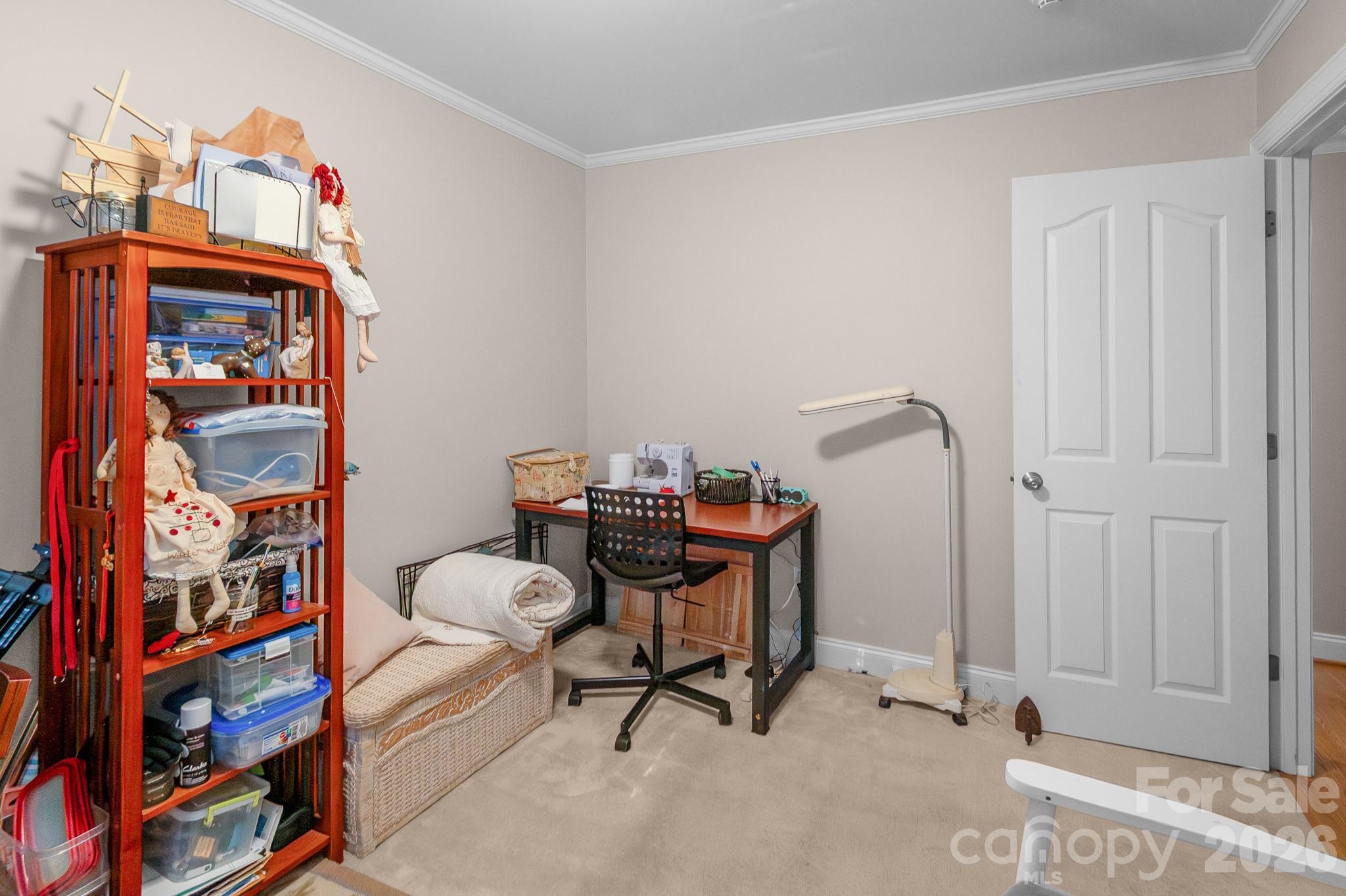 572 Acorn Acres Road Norwood, NC 28128 - Photo 13 of 39 a view of a workspace with furniture and toys