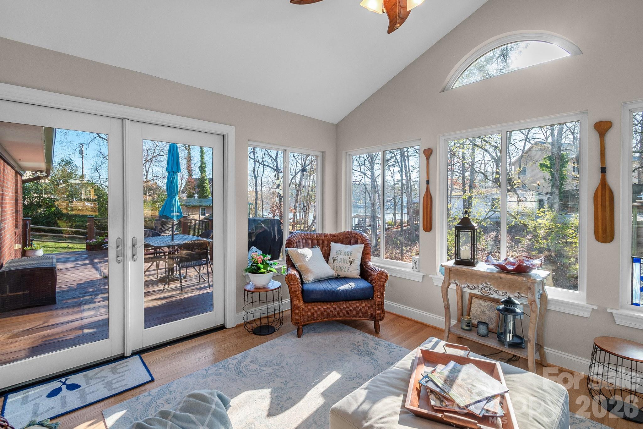 572 Acorn Acres Road Norwood, NC 28128 - Photo 19 of 39 a living room with furniture and large windows