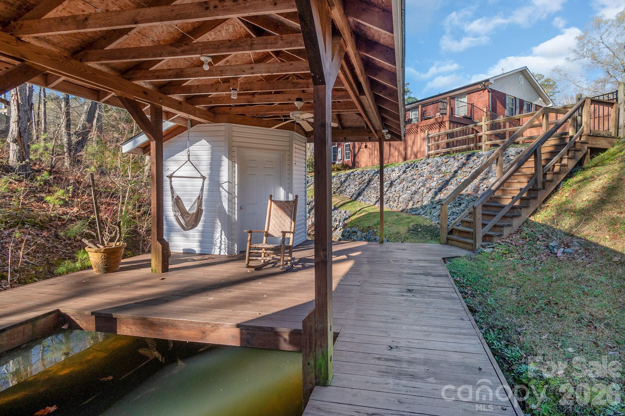 572 Acorn Acres Road Norwood, NC 28128 - Photo 34 of 39 a view of a house with a yard