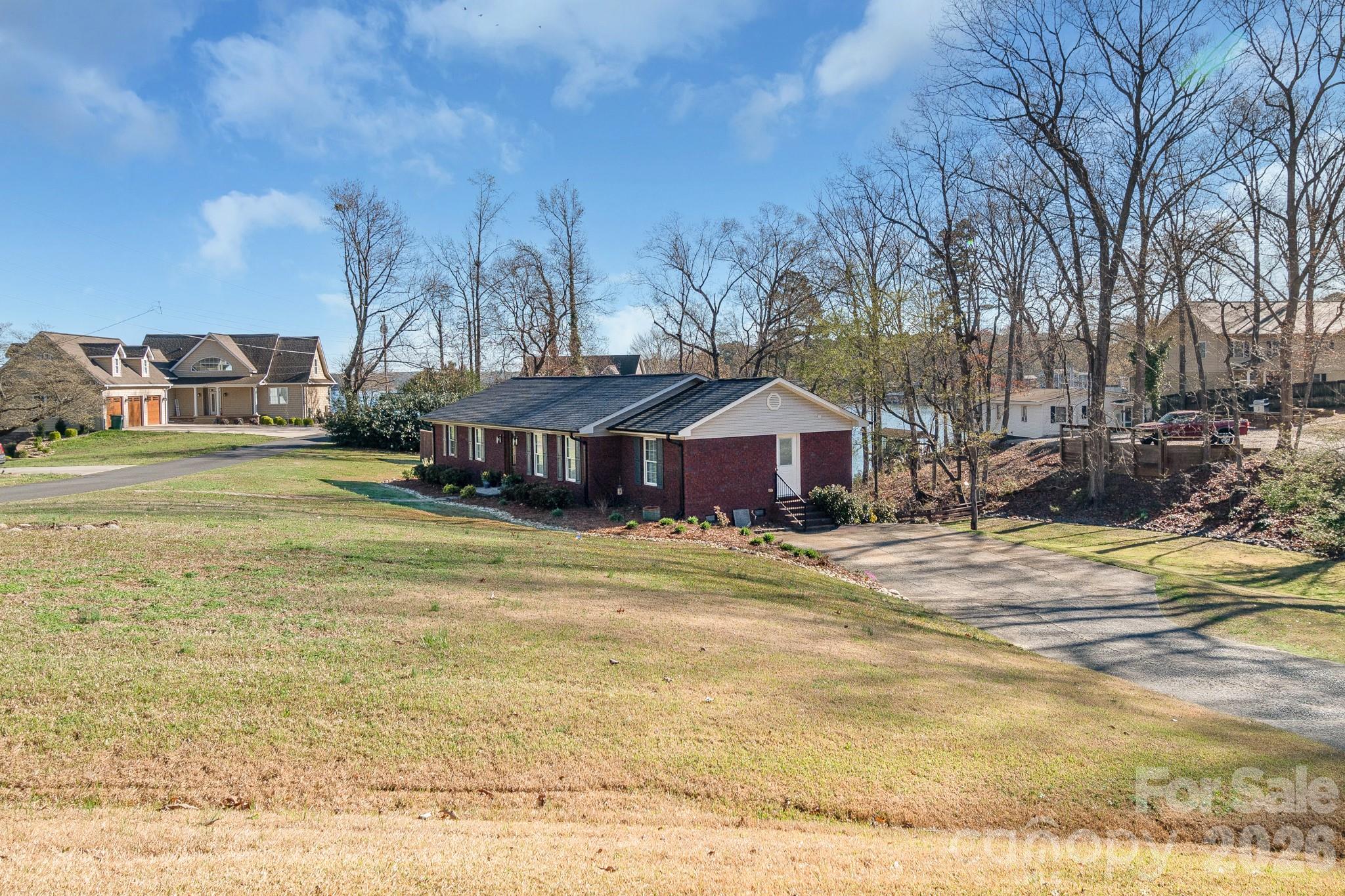 572 Acorn Acres Road Norwood, NC 28128 - Photo 39 of 39 a front view of a house with a yard