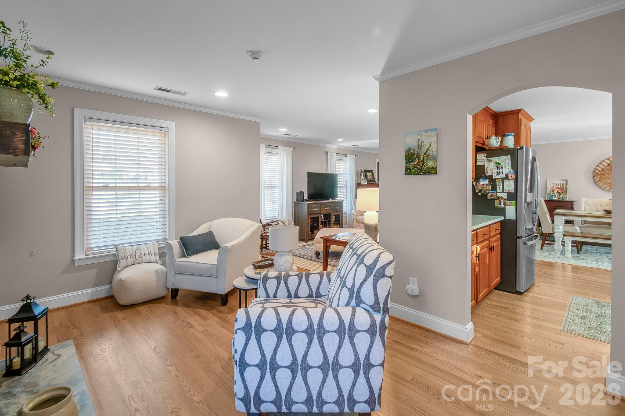 572 Acorn Acres Road Norwood, NC 28128 - Photo 4 of 39 a living room with furniture and wooden floor