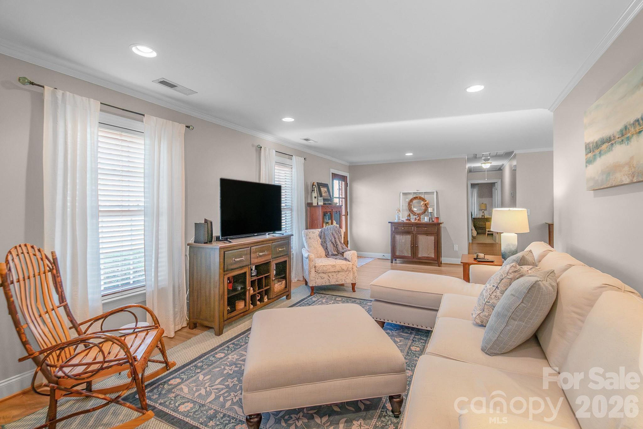 572 Acorn Acres Road Norwood, NC 28128 - Photo 5 of 39 a living room with furniture and a flat screen tv