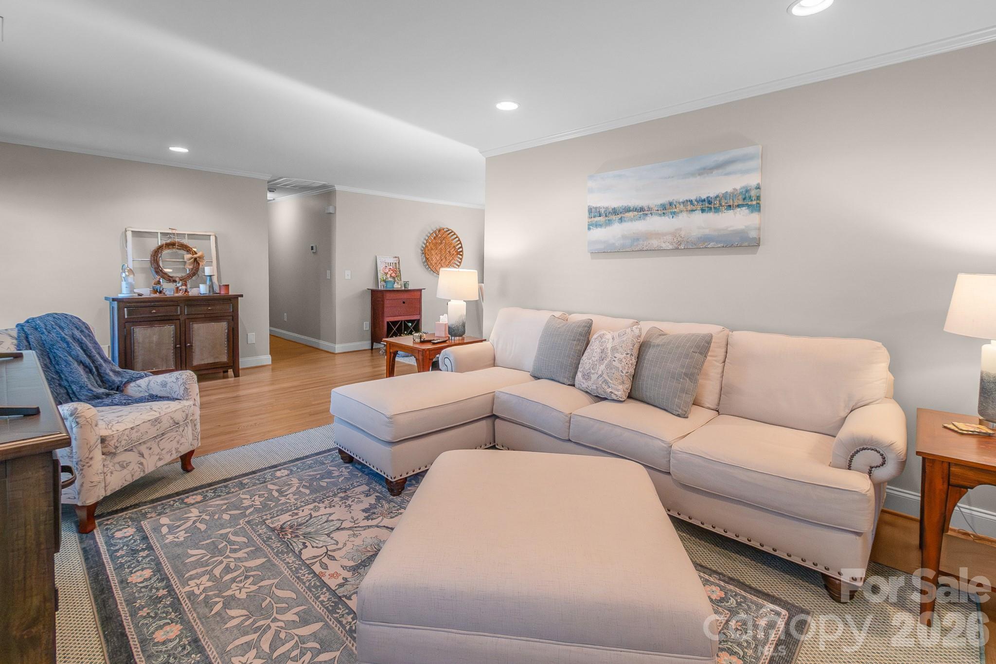 572 Acorn Acres Road Norwood, NC 28128 - Photo 6 of 39 a living room with furniture and a couch