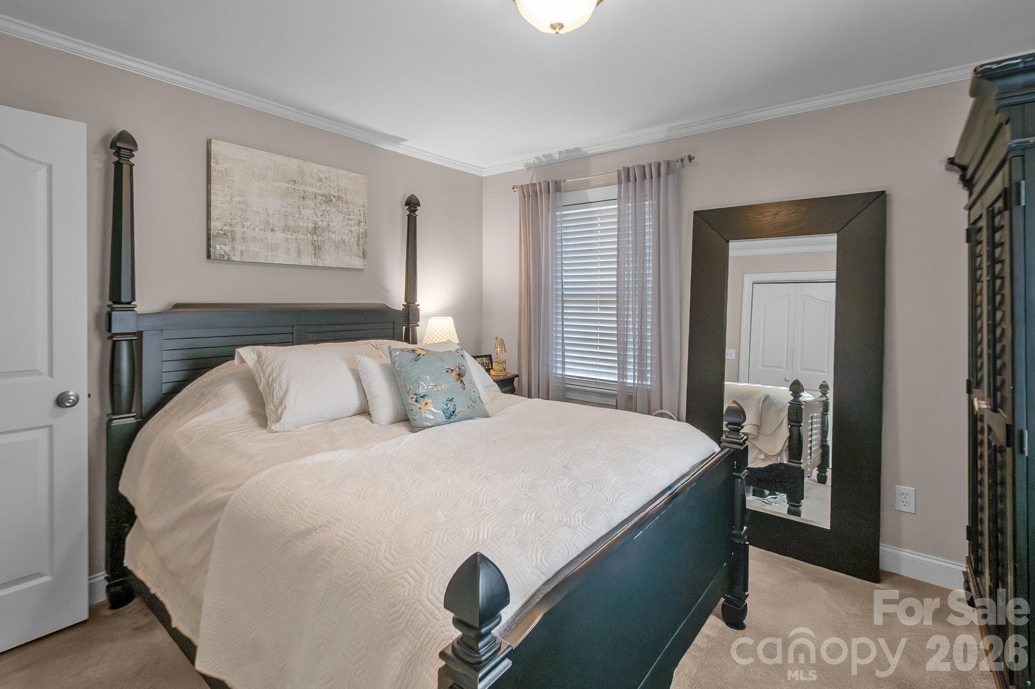 572 Acorn Acres Road Norwood, NC 28128 - Photo 9 of 39 a bedroom with bed and window