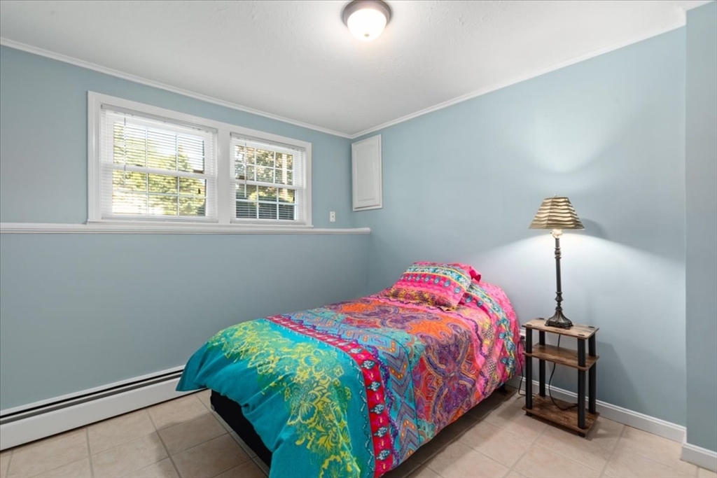 30 South Cross Road Haverhill, MA 01835 - Photo 23 of 42 a bedroom with a bed and a window