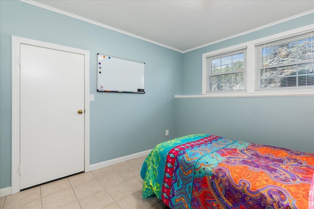 30 South Cross Road Haverhill, MA 01835 - Photo 24 of 42 a bedroom with a bed and a window