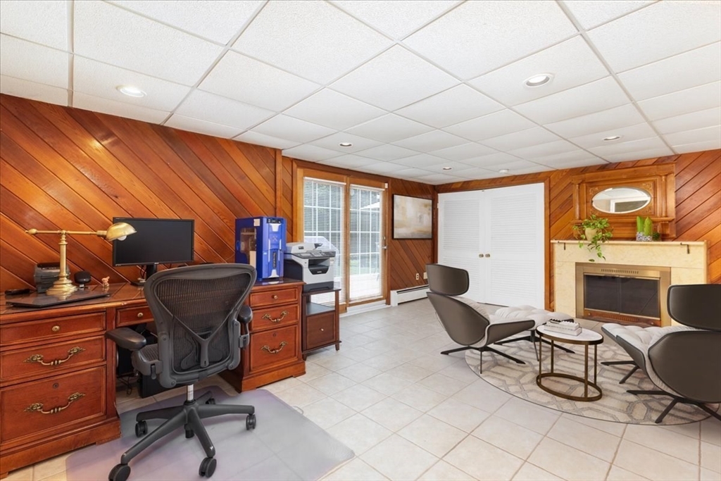 30 South Cross Road Haverhill, MA 01835 - Photo 27 of 42 a view of a livingroom with workspace and a couch