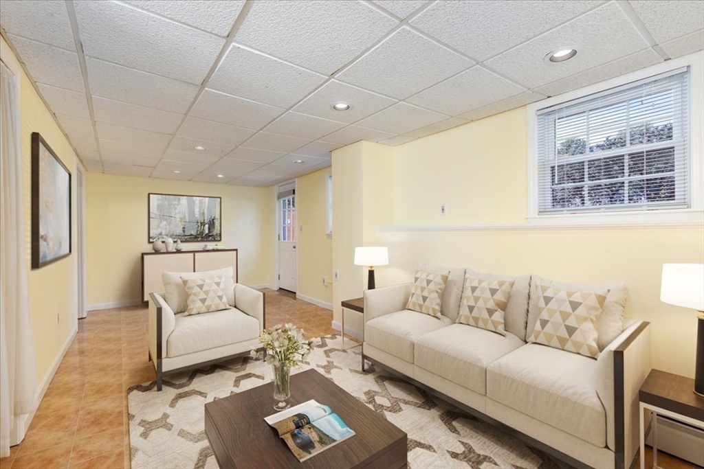 30 South Cross Road Haverhill, MA 01835 - Photo 30 of 42 a living room with furniture and a large window