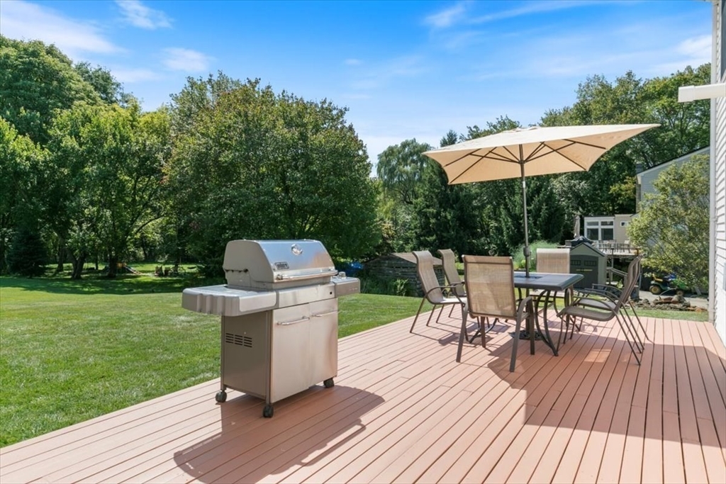 30 South Cross Road Haverhill, MA 01835 - Photo 39 of 42 a view of a table and chairs on roof deck