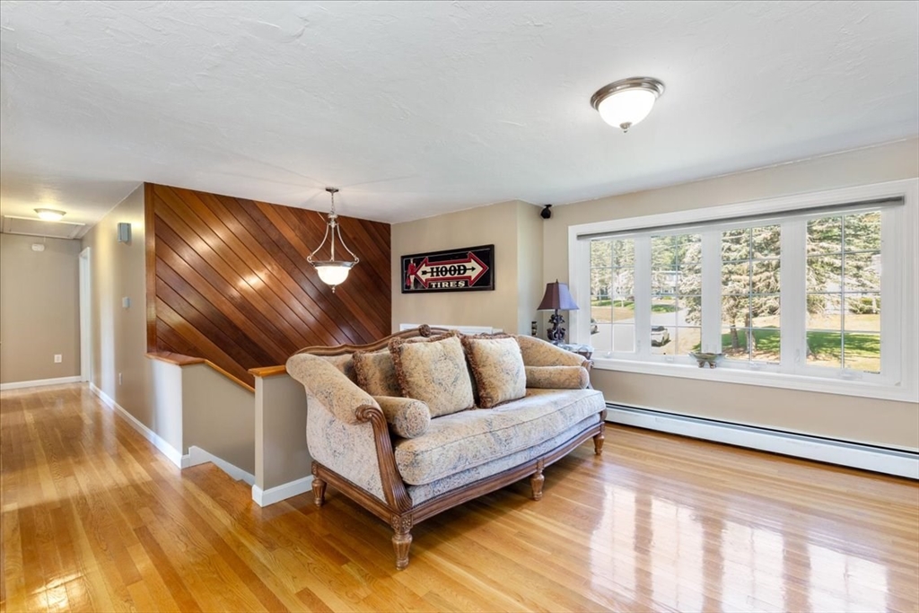 30 South Cross Road Haverhill, MA 01835 - Photo 7 of 42 a living room with furniture and a large window