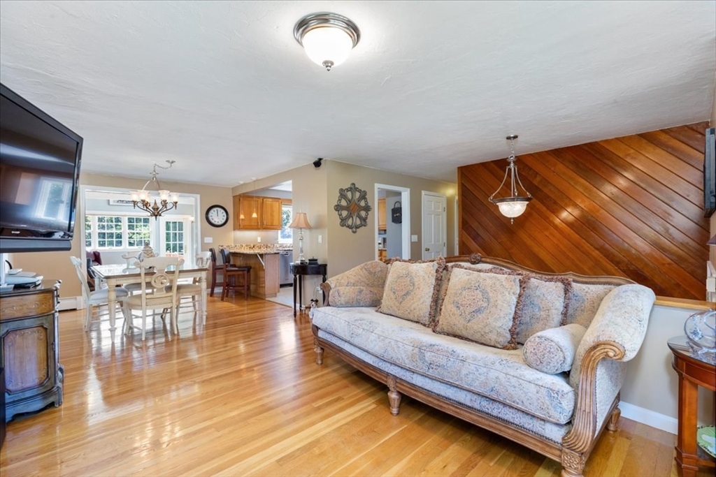 30 South Cross Road Haverhill, MA 01835 - Photo 8 of 42 a living room with furniture and wooden floor