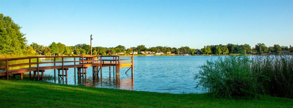 4212 Lake Underhill Road, Unit 5D9 Orlando, FL 32803 - Photo 58 of 58 a view of a garden and lake
