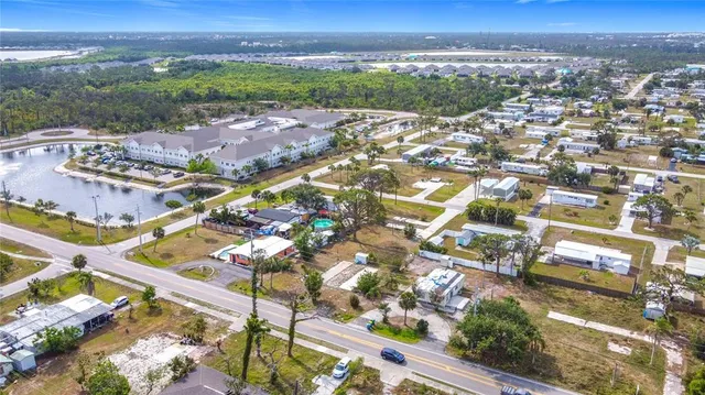 an aerial view of residential building and lake view