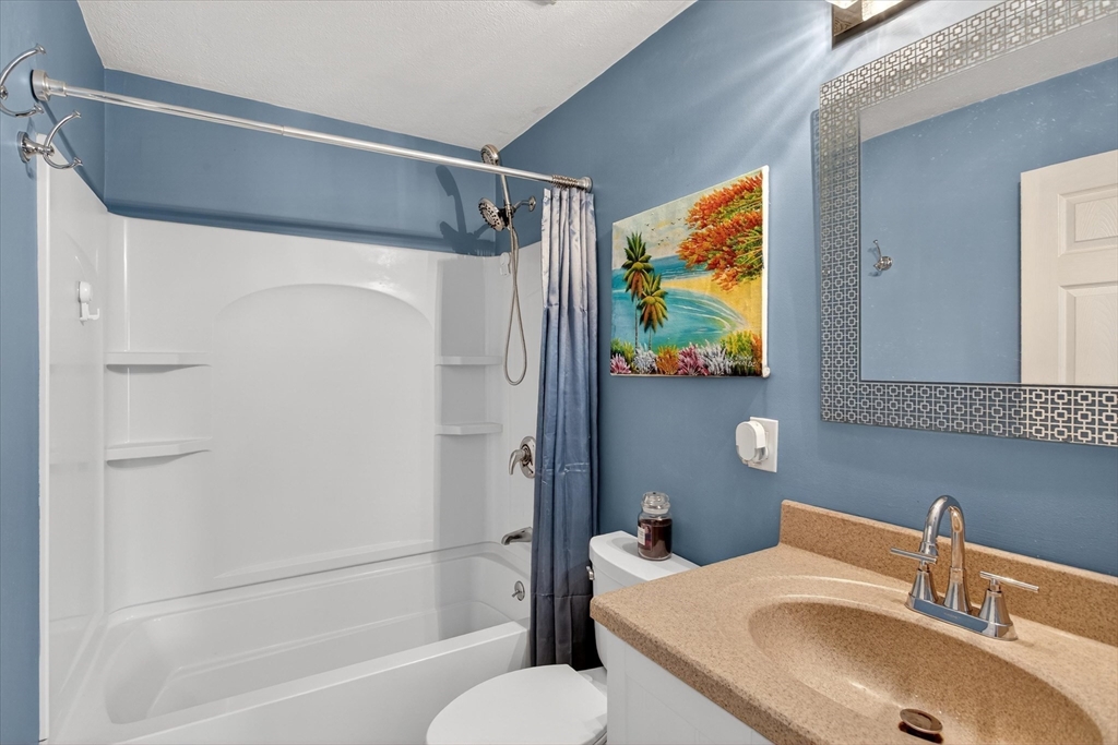 38 Bennett Street, Unit 3D Wakefield, MA 01880 - Photo 15 of 22 a bathroom with a sink toilet and shower