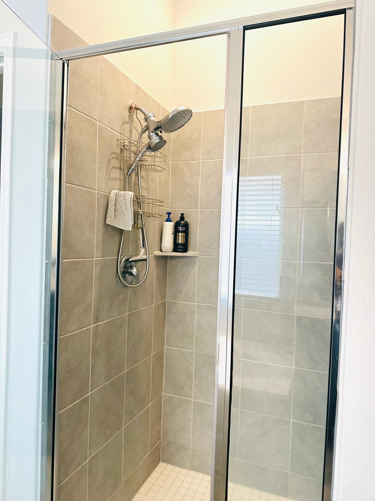 862 Leadtree Loop Buda, TX 78610 - Photo 26 of 40 a bathroom with a shower