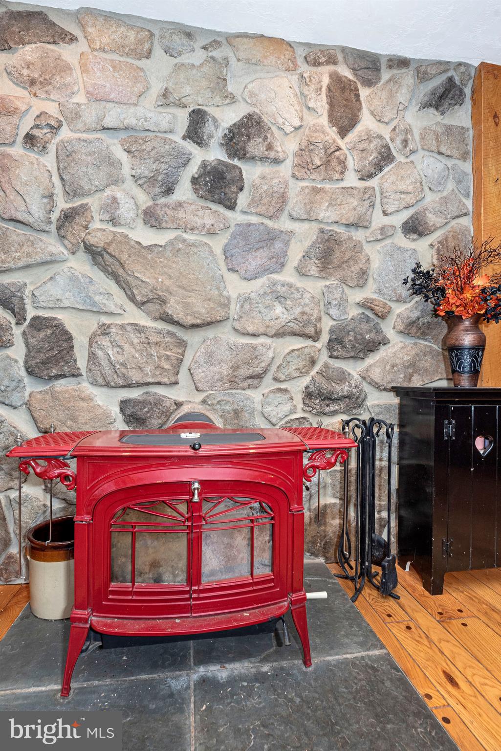 3718 Basford Road Frederick, MD 21703 - Photo 23 of 49 Handsome Wood Stove and Stone Wall